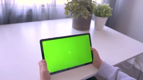 Close up Child using Digital Tablet with Green mock up Screen, Chroma Key Stock Footage 171828659