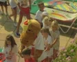 Close up of children being led round pool by children's entertainer SD Footage