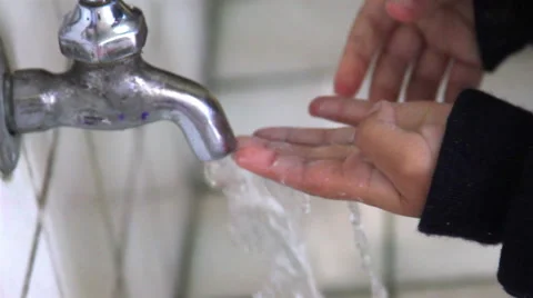 CLOSE UP. Children whasing their hands in the  washbasin in the kindergarten. Stock Footage 48846804