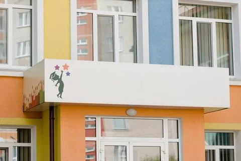 Close-up of children's development center main entrance with copy space Stock Photos