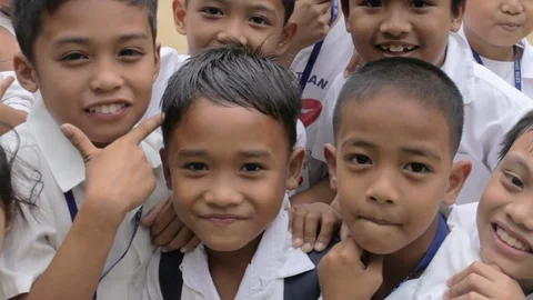 Close up of children's faces in the Philippines Stock Footage