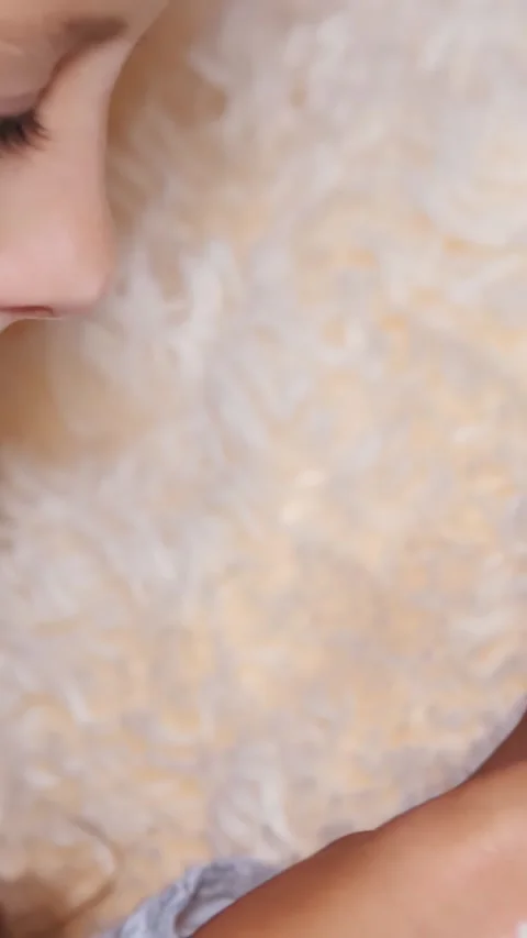 Close-up. children's hands hold a smartphone. ten-year-old girl teenager uses a Stock Footage 315363328