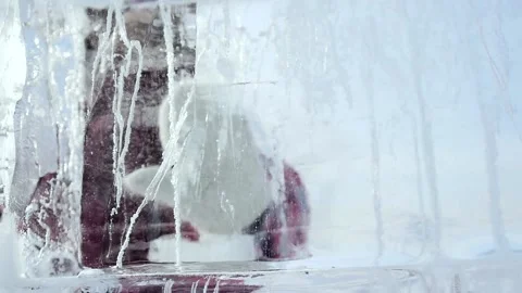 Close-up of children's hands in mittens. view through the transparent ice of a Video stock 155880138