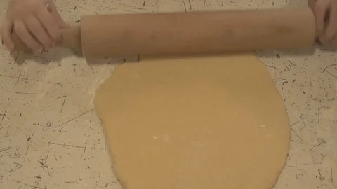 Close up Children's Hands, Rolling Pin and Dough Stock Footage 74143331