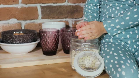 Close-up of children's hands touching beans. Development of fine motor skills. Stock Footage 142660299