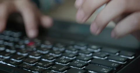 Close-up children's hands typing on laptop computer keyboard. 4K 10-bit Stock Footage 347361845