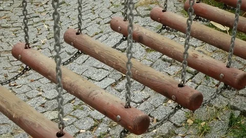 Close up of children's legs going on a suspension bridge in Ropes Park. 4K copy Stock Footage 80423088