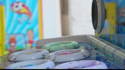 Close-up of a children's slot machine where you need to hit moles coming out of Stock Footage 207563531