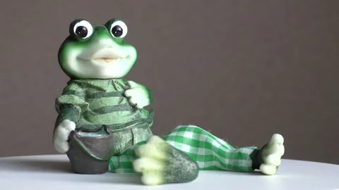 The close-up is a children's toy frog Stock Footage 152648659