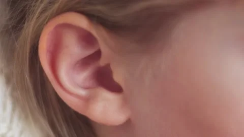 Close-up of a child's ear. Moves the ear Stock Footage 171962347