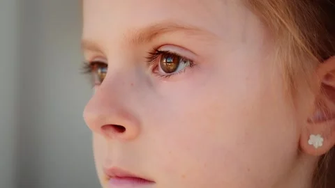 Close-up of a Child's Face with Focus on Eyes Stock Footage 285646864