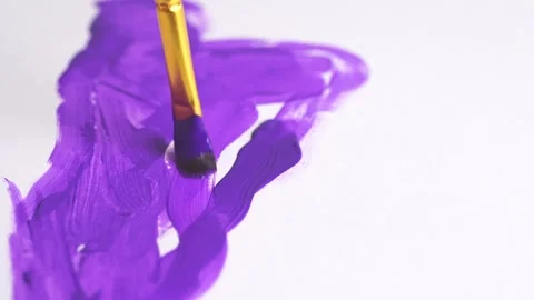 Close-up of child's hand holding paint brush and drawing oil painting. Acry.. Stock Footage 260702853