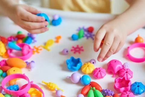Close up of child's hands playing Stock Photos
