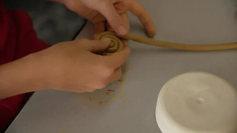 Close-up of child's hands sculping from modeling clay. Stock-Footage 272754877