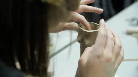 Close-up of child's hands sculping from modeling clay. Stock Footage 272755468