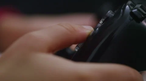 Close up of a child's hands whilst playing video games Stock Footage 48705552