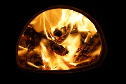 Close up of a Chiminea on fire in a garden 写真素材