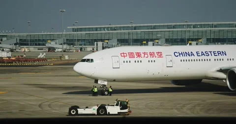 Close-up of a China Eastern Airlines airplane on runway Stock Footage 315093182