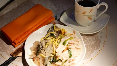 Close-up of Chinese breakfast on the table for a business class passenger Stock Footage 242409516