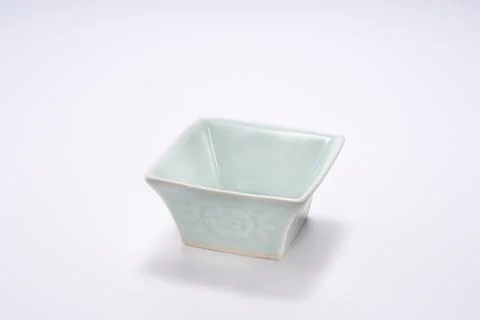 Close-up of Chinese style ceramic texture rice bowl with square flower patt.. Stock Photos