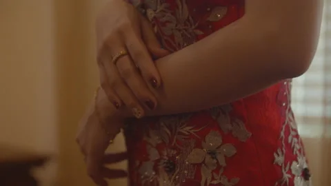 Close-Up of Chinese Woman's Right Hand Moving Slowly Stock Footage 161225328