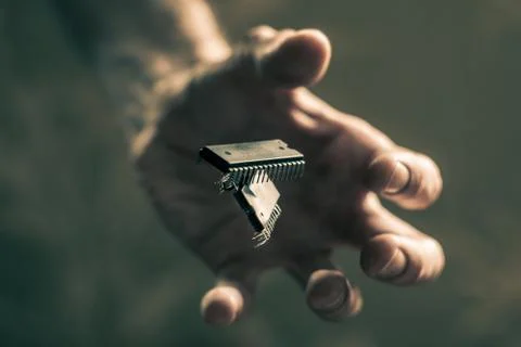 Close-up of chips thrown by hand. Stock Photos
