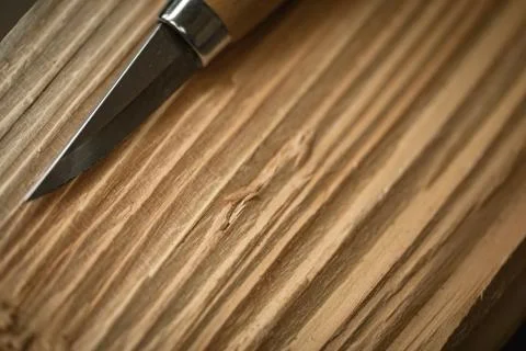 Close-up of chisel on carved wood Stock Photos