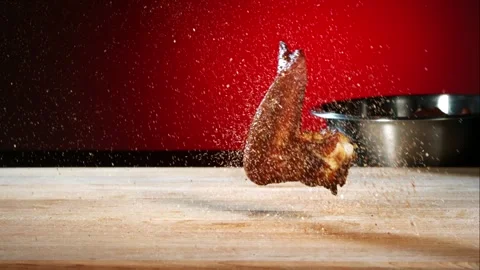 Close up of chocolate bar breaking into pieces with crumbs fall Stock Footage 326030963