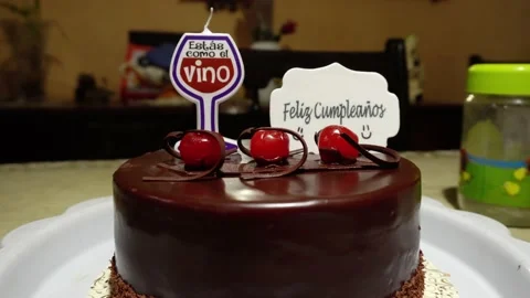 Close-up of a chocolate cake with cherries and with messages of "you are like Stock Footage 167293616