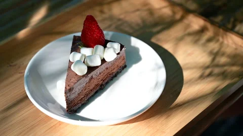 Close up chocolate cake with strawberry on top. Stock Footage 153448952