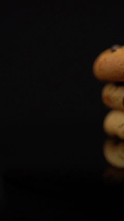 Close Up Chocolate Chip Cookies on Reflective Surface Stock Footage 330516778