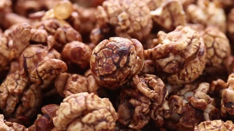 Close-up of Chocolate Coated Popcorn Rotating Vídeo Stock 272284623
