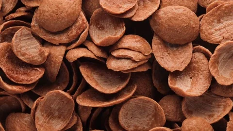 Close-up chocolate corn flakes, rotation in circle. Sweet crispy breakfast Stock Footage 238899722