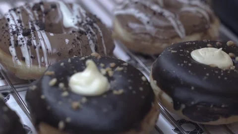 Close-up of chocolate donuts Stock Footage 265934410