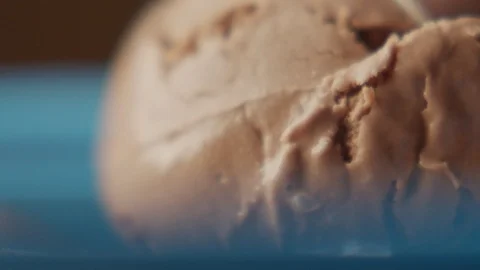 Close-up chocolate ice cream spoon. Slow motion video Stock Footage 120016900