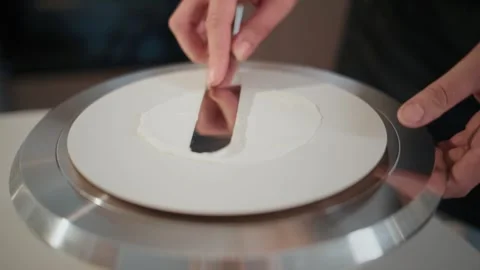 Close-up of chocolate spreading on a turntable Stock Footage 336044772
