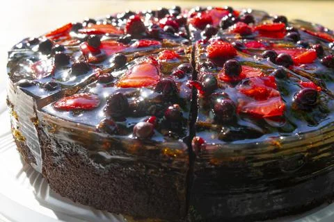 Close-up of the chocolates cake with strawberries Stock Photos
