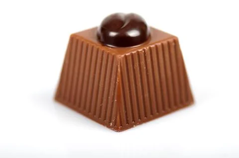 Close chocolates on white background Stock Photos