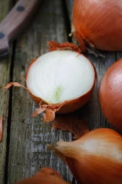 Close-up of chopped onions on an old rustic table. Macro shot Stock Photos
