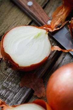 Close-up of chopped onions on an old rustic table. Macro shot Stock Photos