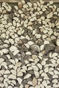 Close up of chopped wood in a stack Stock Photos