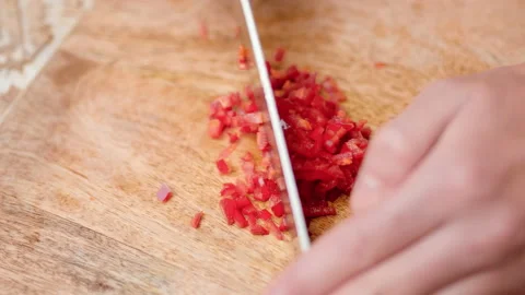 Close-up chopping Chili Pepper with a chef knife in 4K. Stock Footage 138303918