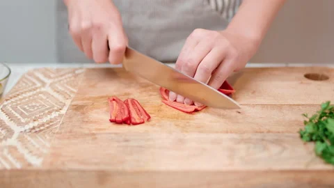 Close-up chopping Chili Pepper with a chef knife in 4K. Stock Footage 138304246