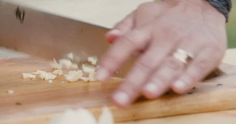 Close up of chopping garlic Stock Footage 119846465