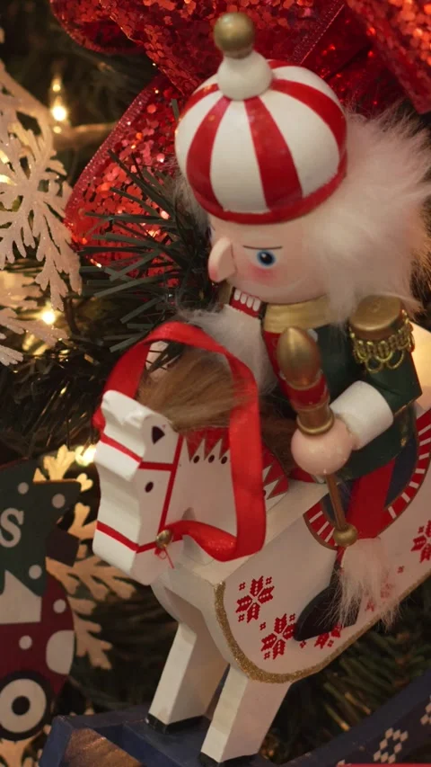 Close-up of Christmas decoration with nutcracker riding horse and car on 스톡 동영상 344905896