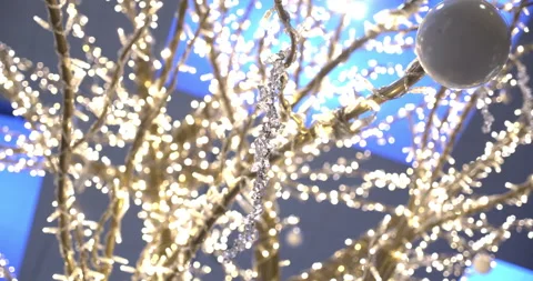 Close up of Christmas decoration. Tree branches wrapped with string Stock Footage 147218636