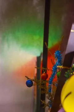 Close up of the christmas decoration on the xmas tree banch on the unfocused Stock Photos