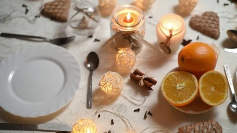 Close-up of christmas decorations and oranges at table Stock Footage 83143803
