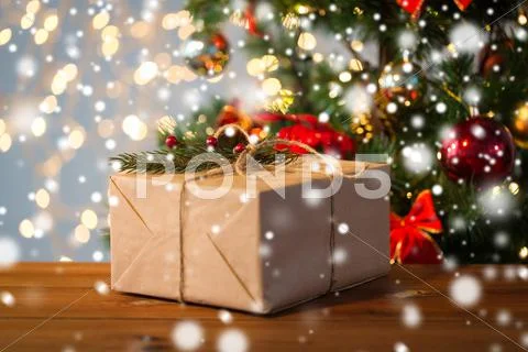 Close up of christmas gift with fir brunch Stock Photos