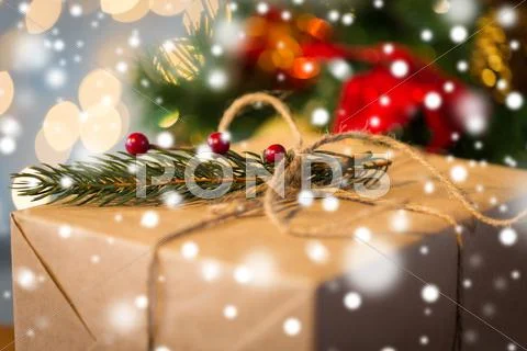 Close up of christmas gift with fir brunch Stock Photos